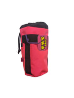 Pink and black bag with PXN label on a white surface